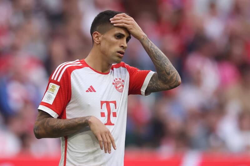 Joao Cancelo looks dejected after Bayern Munich's loss to RB Leipzig. Getty Images