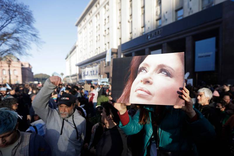 Demonstrators in Buenos Aires support Argentina's Vice President Cristina Kirchner, who survived an assassination attempt on Friday when a handgun aimed at her from close range failed to fire. AFP
