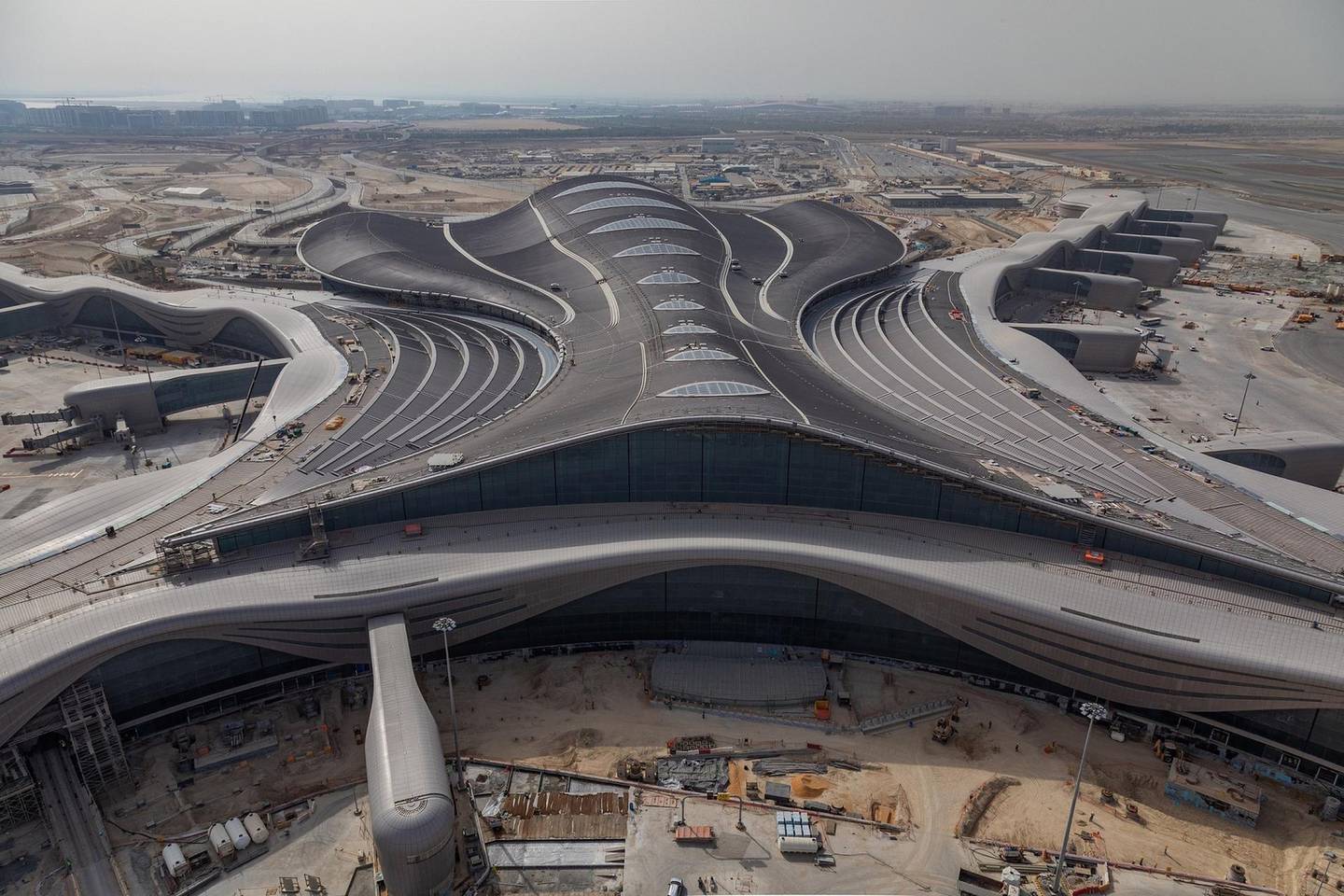 The Midfield Terminal could provide an exquisite riposte to Singapore's Changi when it opens soon, with its vast roof span, huge floor plan and airy feel. Abu Dhabi Airports