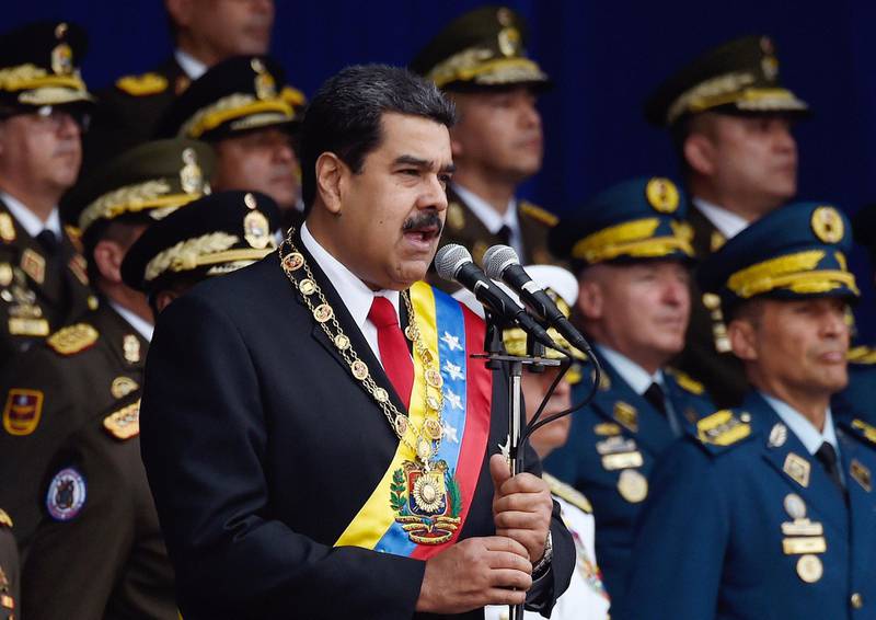 (FILES) In this file photo taken on August 4, 2018, Venezuelan President Nicolas Maduro delivers a speech during a ceremony to celebrate the 81st anniversary of the National Guard in Caracas. - Officials from US President Donald Trump's administration met secretly with Venezuelan military officers to discuss plans to oust President Nicolas Maduro but eventually decided not to help, The New York Times reported on September 8, 2018. (Photo by Juan BARRETO / AFP)