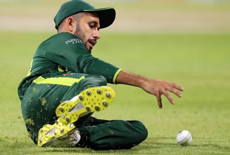Pakistan's Mohammad Haris makes a diving stop. Chris Whiteoak / The National