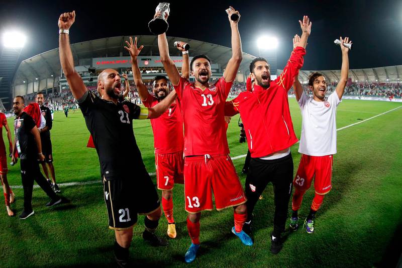 Bahrain players celebrate. AFP