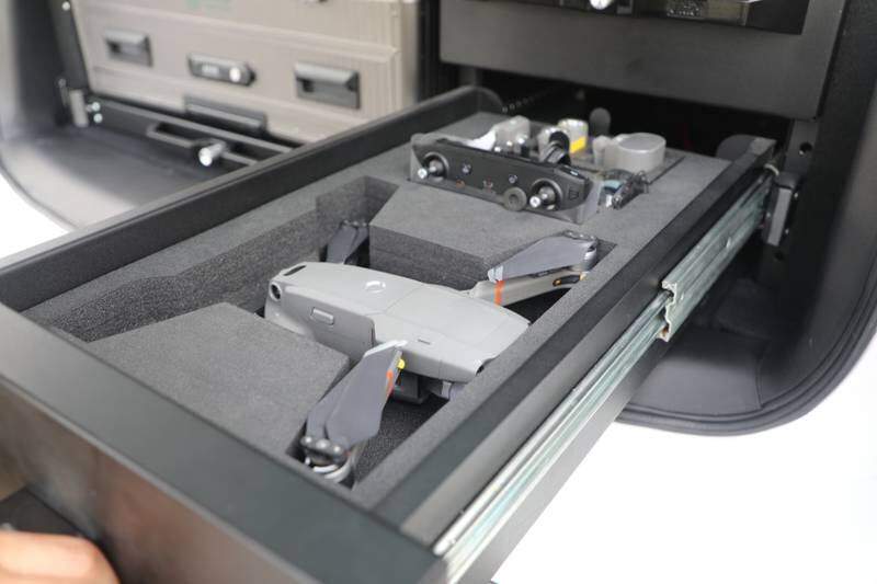 A drone storage box in the boot.