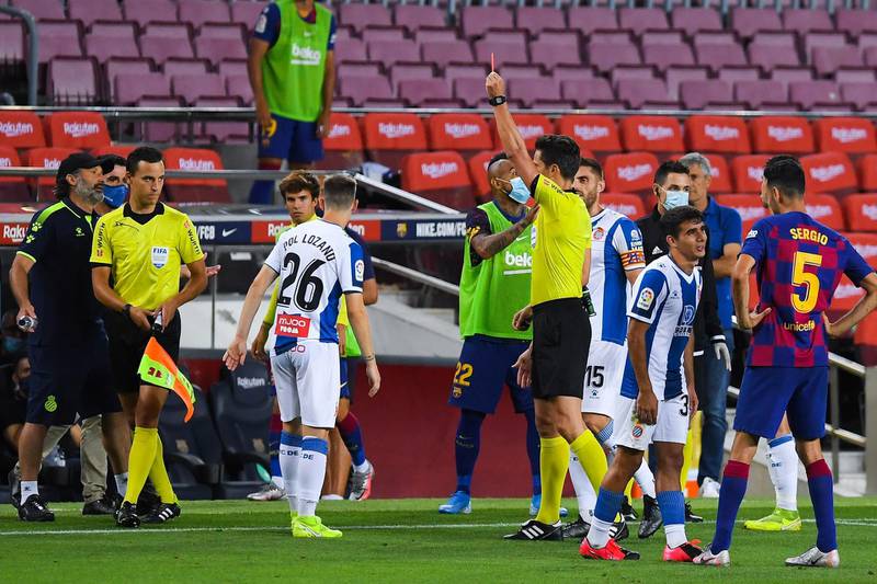 Pol Lozano of Espanyol is shown a red car by the referee. Getty Images