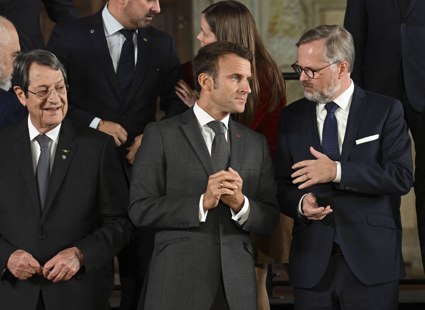 French President Emmanuel Macron, left, speaks to Czech Prime Minister Petr Fiala. EPA