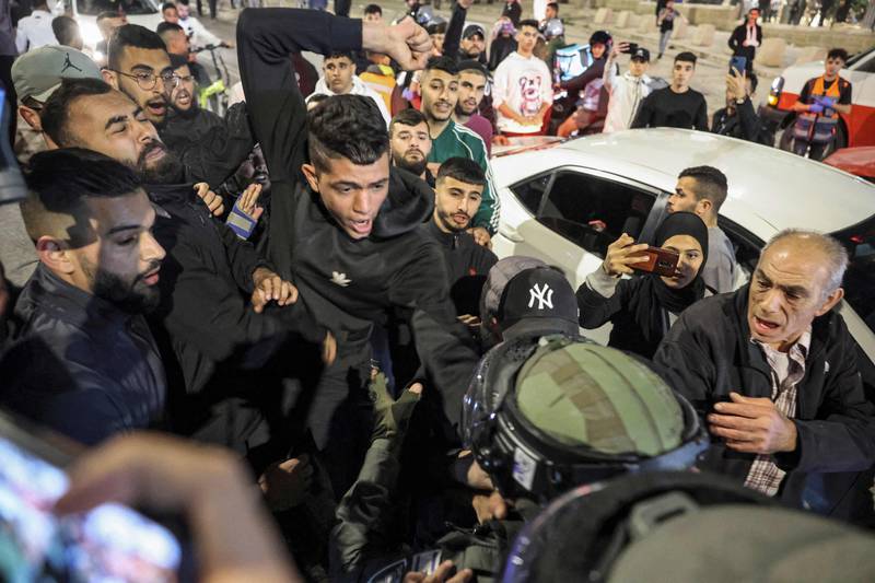 Israeli troops scuffle with Palestinians during clashes near the Damascus Gate of the Old City of Jerusalem. AFP