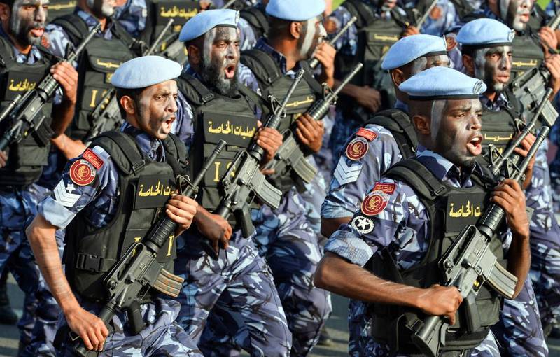 Members of Qatar’s Internal Security Force (ISF) participate in a military parade to mark Qatar’s National Day celebration.