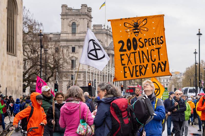 Environmental activists in the UK demand action on rising carbon emissions. Bloomberg