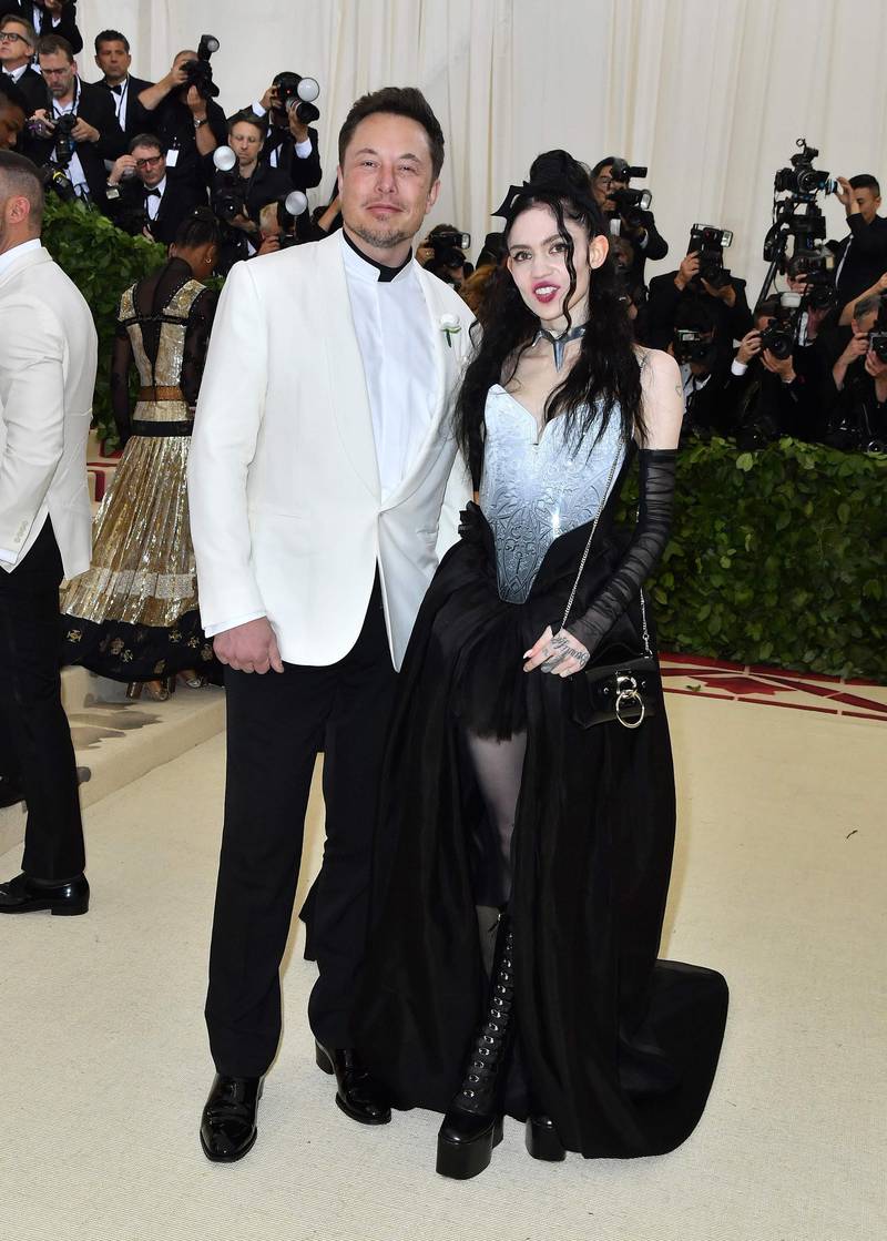 Elon Musk and Grimes made their debut as a couple on the red carpet - and the pair reportedly designed Canadian musician Grimes' dress together. AFP
