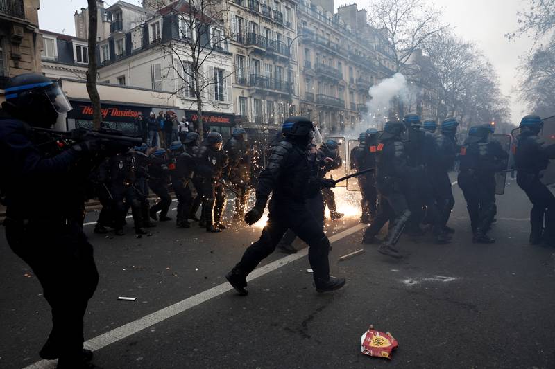 French riot police clash with protesters. Reuters