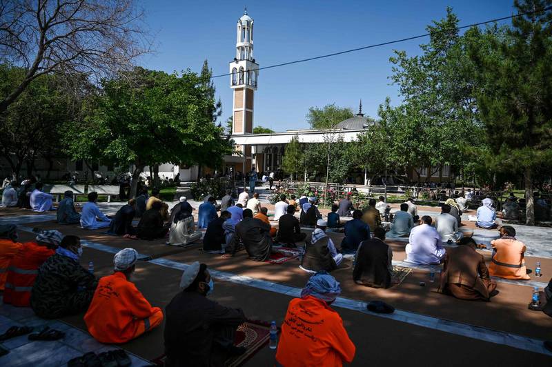 Muslims offer prayers at the start of the Eid Al Fitr at the Wazir Akbar Khan mosque in Kabul on May 24, 2020. AFP