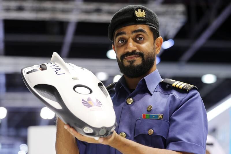 Nawaf Saleh from Dubai Customs with a submarine drone at Gitex 2021 in Dubai. Chris Whiteoak / The National