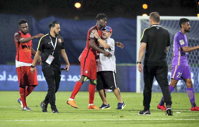 DUBAI , UNITED ARAB EMIRATES , APRIL 12   – 2018 :- Diego Maradona , coach of Fujairah meeting with players after the President Cup quarter final football match between Al Ain vs Fujairah club held at Shabab Al Ahli Dubai football stadium in Dubai. ( Pawan Singh / The National ) For Sports. Story by John