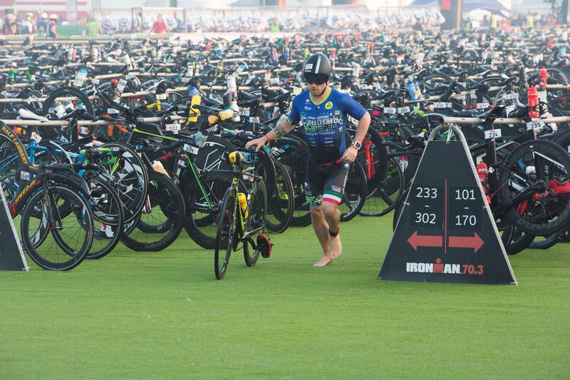 Dubai, United Arab Emirates - Participants getting their bikes for cycling race at the Ironman race at Jumeirah open beach, Dubai. Leslie Pableo for The National