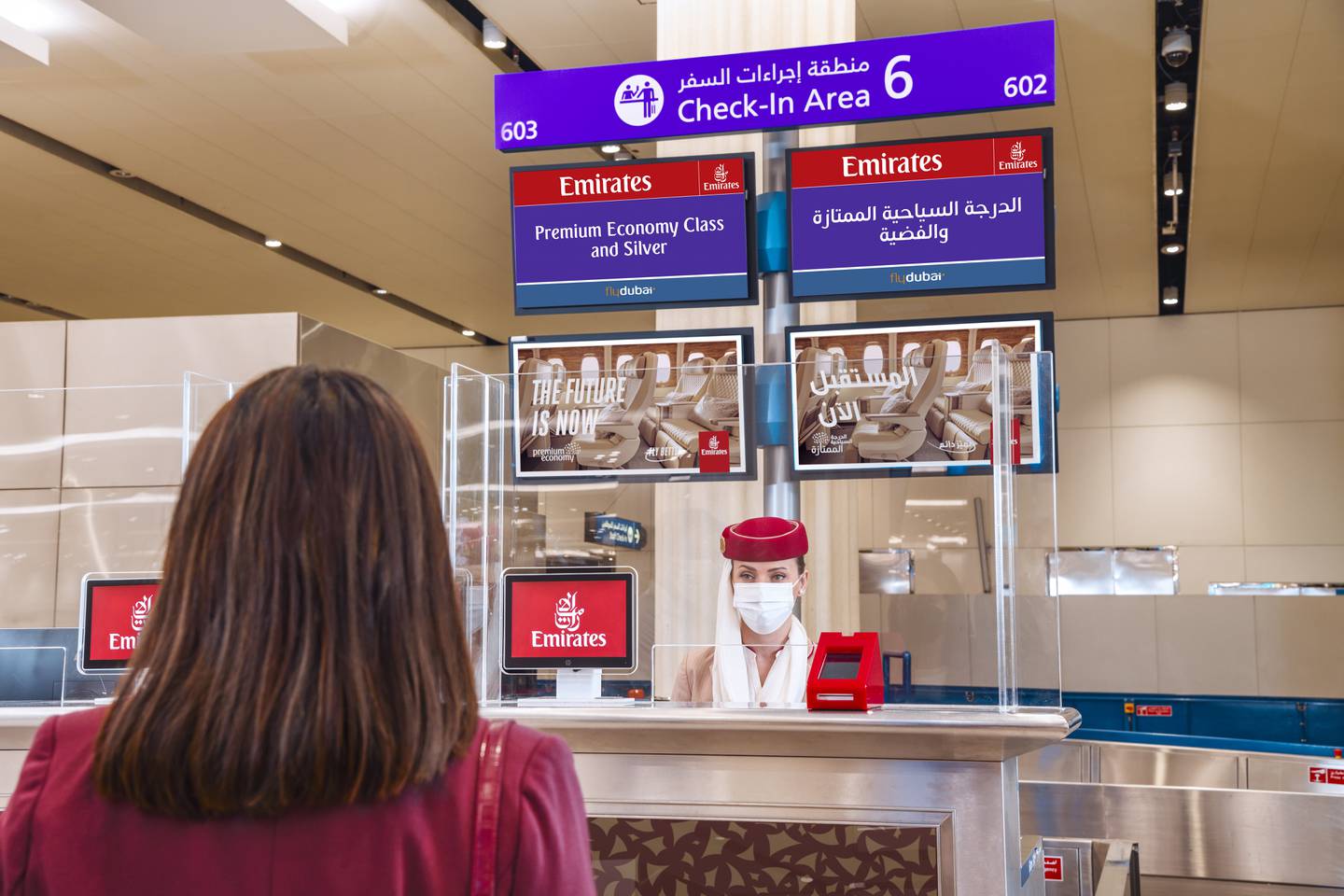 The premium economy experience starts on the ground, with a dedicated check-in counter at Dubai International Airport. Photo: Emirates