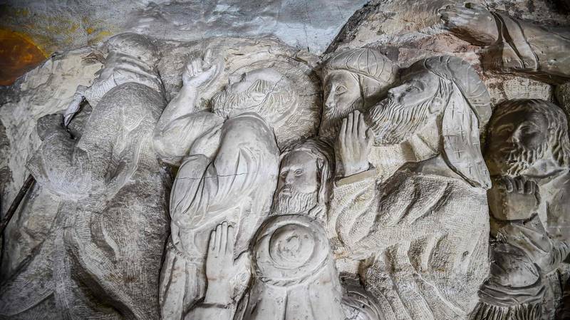 This picture taken  shows a view of a relief sculpture made by Polish artist Mario at the St. Simon the Tanner Monastery complex in the Egyptian capital Cairo's eastern hillside Mokattam district. Mario spent more than two decades carving the rugged insides of the seven cave churches and chapels of the rock-hewn St. Simon Monastery and church complex atop Cairo's Mokattam hills, with designs inspired by biblical stories. It was all done to fulfil the wishes of the church's parish priest who met Mario in the early 1990s in Cairo. The Polish artist, who had arrived in Egypt earlier on an educational mission, was then looking for an opportunity to serve God at the monastery. AFP