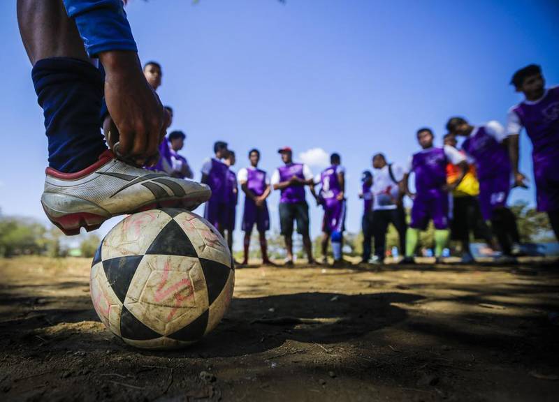 Youngsters of a team from Managua’s neighbourhood Villa Reconciliacion play football against another team at the Don Bosco Youth Centre in Managua, on January 17, 2016. Football is gaining enthusiasts in Nicaragua where baseball has been historically dominant but is now giving way to the new sport, analysts said. Inti Ocon / AFP