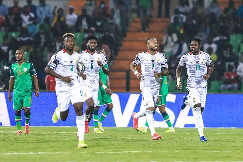 Ghana players react after scoring their first goal . AFP