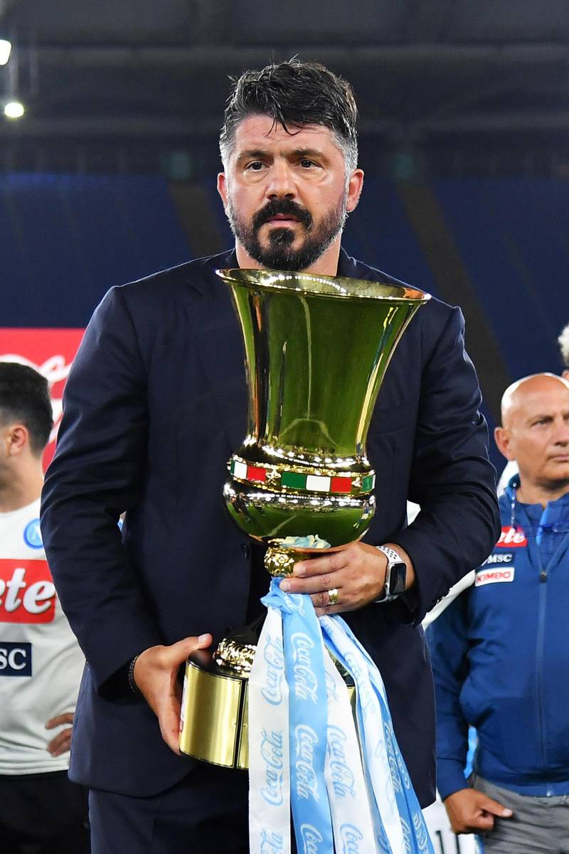 Napoli coach Gennaro Gattuso celebrates with the trophy. EPA
