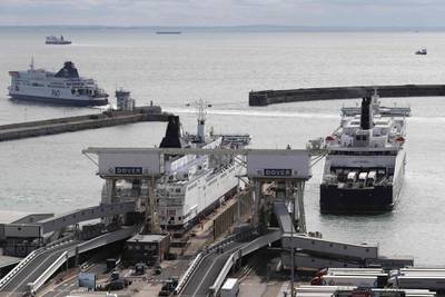 (FILES) In this file photo taken on September 14, 2018 A ferry leaves Dover ferry port in Dover, southeast England on September 14, 2018. Contemplating the chaos that Brexit could cause at the UK-France border, worried truck driver Peluso Donati told AFP: "There are days when it's a mess, but with this, it'll be even worse." He has to go through six tests in the hour before boarding the Eurotunnel undersea rail shuttle, including having the truck thoroughly checked over with sniffer dogs, and clearing French and British customs. More controls in the event of a no-deal Brexit could double these transit times, he said and as British Prime Minister Theresa May tries to convince MPs to accept her draft deal with the EU, which both Europhiles and Eurosceptics have vowed to torpedo, the threat of a sudden exit from the European Union without a negotiated agreement looms large.
 / AFP / Adrian DENNIS
