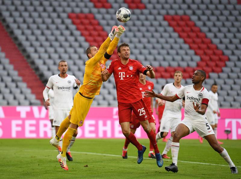 Bayern Munich's Thomas Muller in action with Eintracht Frankfurt's Kevin Trapp. AP