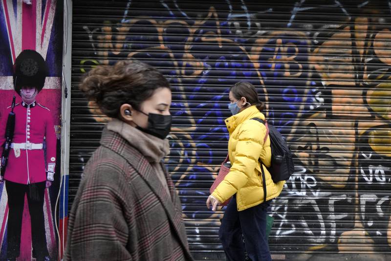 Oxford Street in London, on January 10. In the UK, mask-wearing in public places will be dropped on January 26. AP