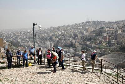 Tourists visit the Amman Citadel, an ancient Roman landmark, in Amman, Jordan. Reuters