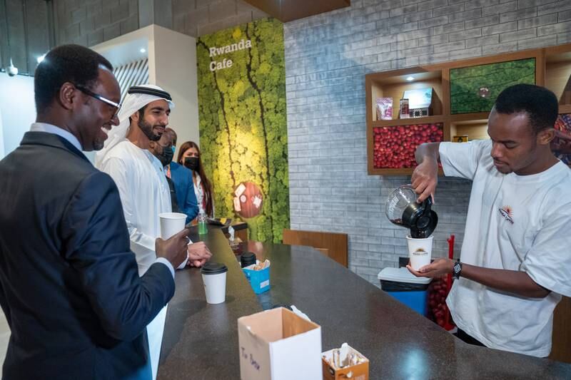 Sheikh Shakhbout enjoys a cup of coffee at Expo 2020 Dubai.