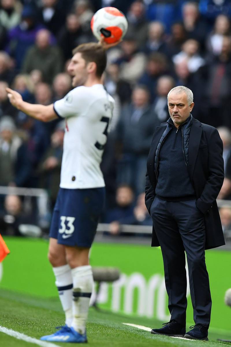 Jose Mourinho looks on as Tottenham defender Ben Davies takes a throw-in. AFP