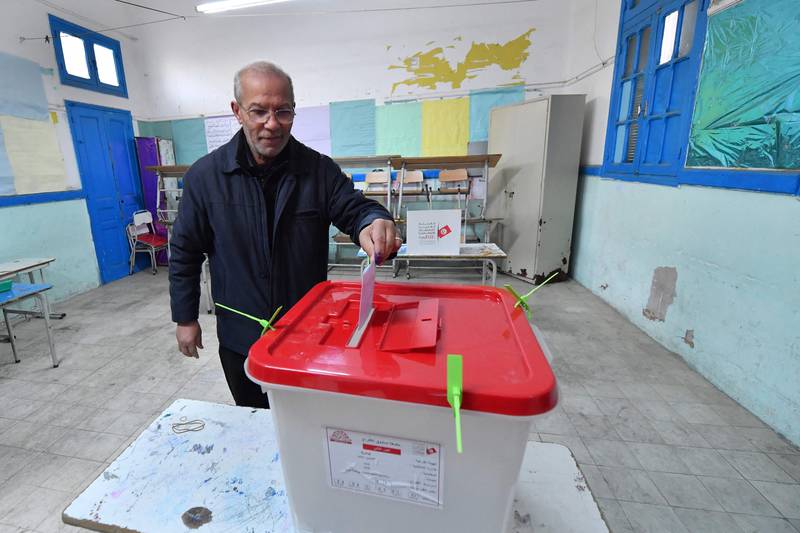 A Tunisian voter casts his ballot in Tunis, in the second round of parliamentary elections. AFP