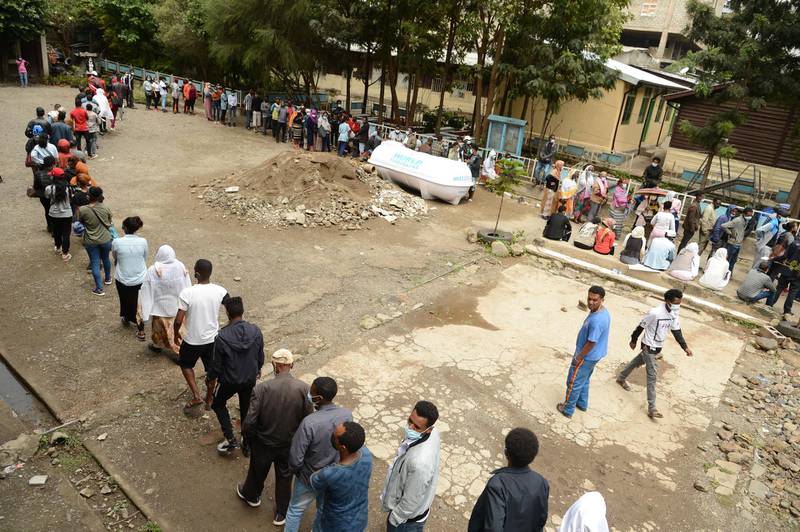 Ethiopians wait in line to cast their ballots in the presidential elections at a polling station in Addis Ababa, Ethiopia. EPA