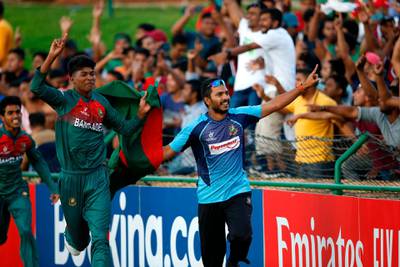 Bangladesh players on a victory lap after beating India to lift the ICC Under-19 World Cup final. AFP