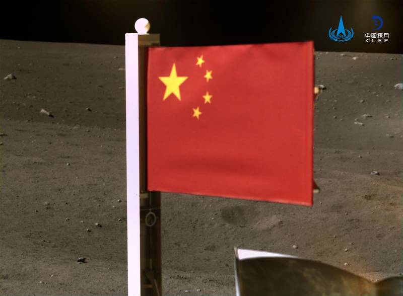 A Chinese national flag unfurled from the Chang'e-5 lunar probe taken on December 4. 
China National Space Administration / AFP