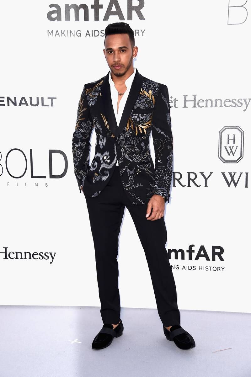Lewis Hamilton, in a metallic brocade jacket by Ports 1961, arrives at amfAR's 23rd Cinema Against Aids Gala at Hotel du Cap-Eden-Roc on May 19, 2016. Getty Images
