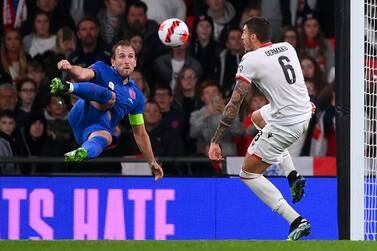 LONDON, ENGLAND - NOVEMBER 12: Harry Kane of England scores their side's fifth goal and his hat-trick during the 2022 FIFA World Cup Qualifier match between England and Albania at Wembley Stadium on November 12, 2021 in London, England. (Photo by Laurence Griffiths/Getty Images)