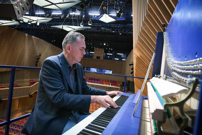 Setting new musical heights, German-born innovator David Klavins has crafted what is believed to be the world's largest vertical piano that sits in a concert hall in Latvia. AFP