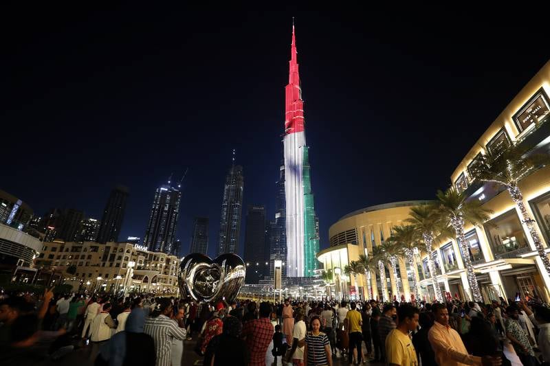 Burj Khalifa in Dubai illuminated in the colours of the national flag. Pawan Singh / The National