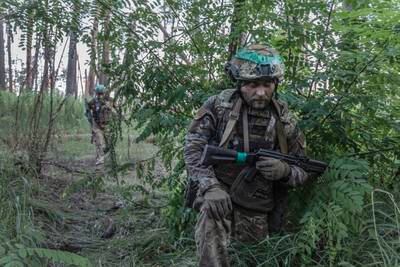 Ukrainian soldiers in Serebryansky Forest, Luhansk region, in eastern Ukraine, in July. Getty Images