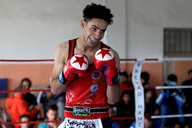 Mousa Kazem from al-Nahrawan kick boxing club competes during the first Iraqi kick boxing championship in Baghdad. AFP