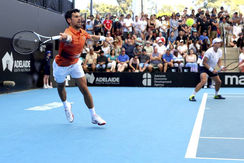 Novak Djokovic plays a return shot. AP Photo
