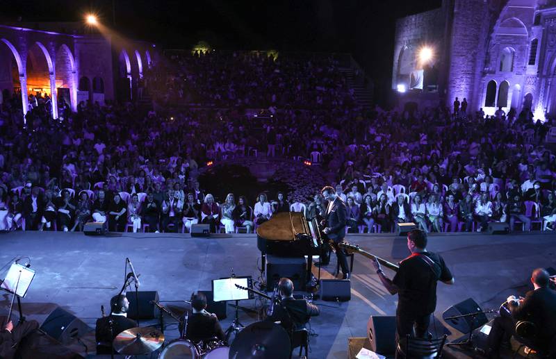 Lebanese Armenian composer and pianist Guy Manoukian performs at the Beiteddine Festival, in the historic eponymous palace in Lebanon's Chouf moutains. AFP
