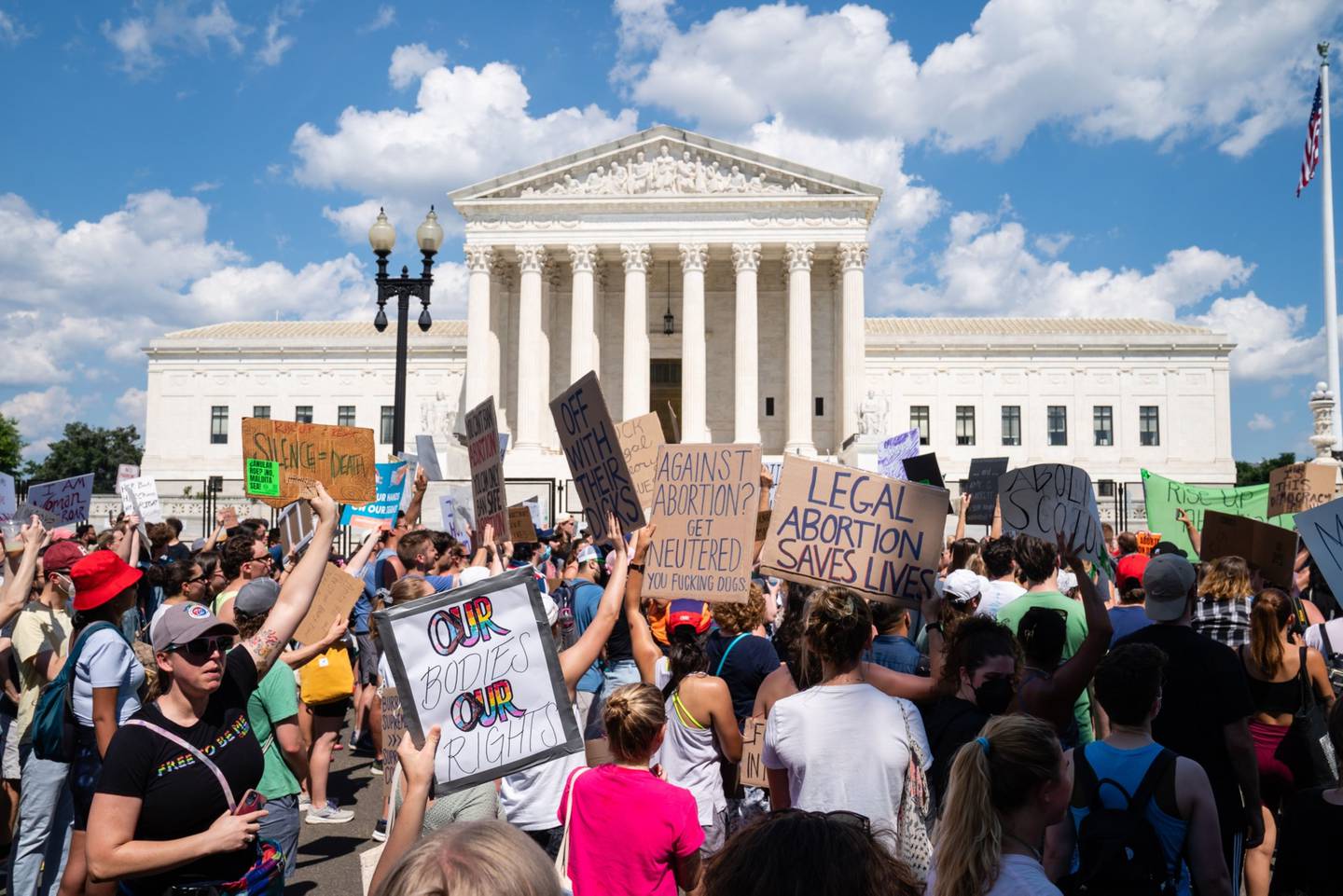 Abortion rights demonstrators chant outside the US Supreme Court in Washington. Bloomberg.