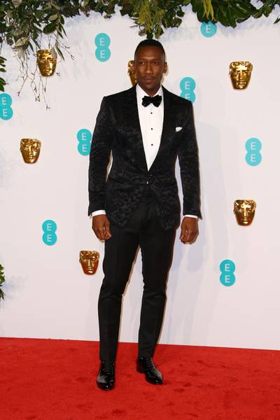 Actor Mahershala Ali poses for photographers upon arrival at the BAFTA awards in London, Sunday, Feb. 10, 2019. (Photo by Joel C Ryan/Invision/AP)