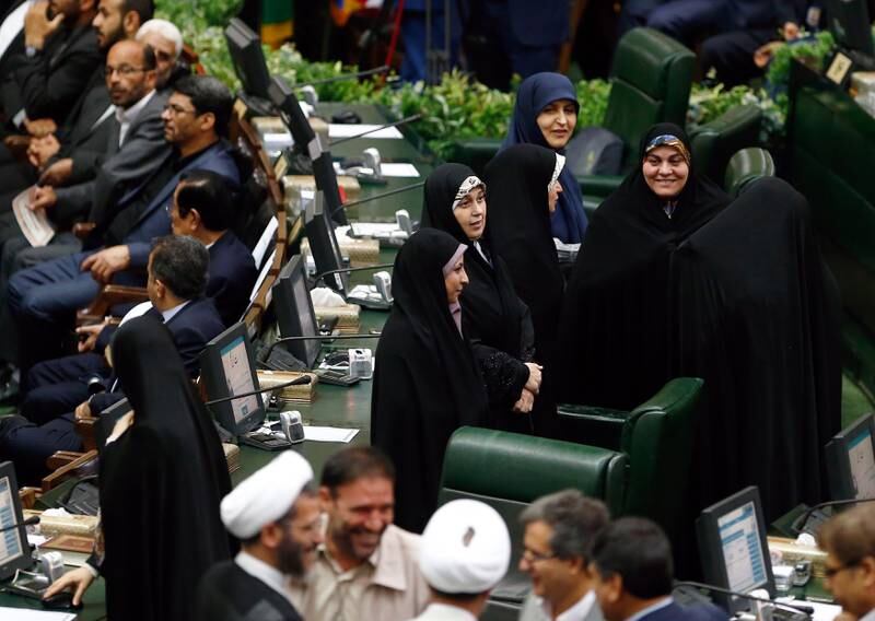 epa06126588 Iranian women lawmakers attend as the Iranian President Hassan Rouhani being sworn-in for his second four-year term of presidency at the  Iranian parliament in Tehran, Iran, 05 August 2017. Iran's new president, Hassan Rouhani, was sworn in on 05 August before parliament in Tehran in a ceremony that foreigners attended for the second time since the Islamic Revolution in 1979. Rouhani is to present his cabinet to the 290-seat parliament for approval in the next two weeks.  EPA/ABEDIN TAHERKENAREH