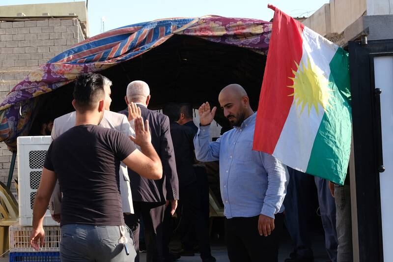A relative of Hossien Sabir, who was killed in the recent violence, receives mourners in Kirkuk city, northern Iraq. EPA
