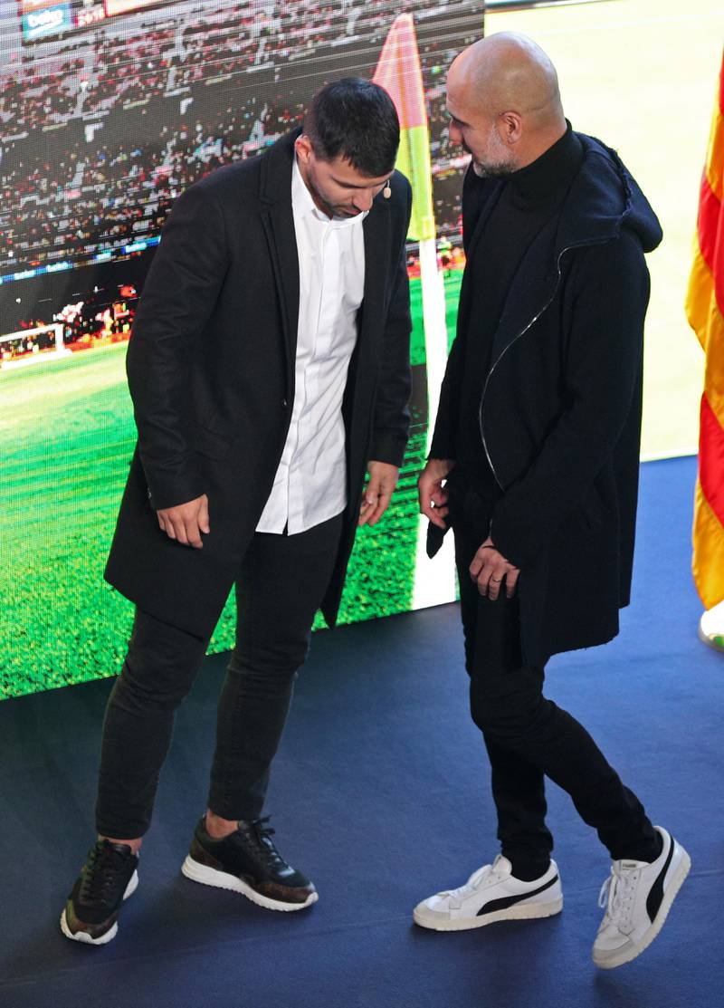 Sergio Aguero talks to Pep Guardiola at Camp Nou. Reuters