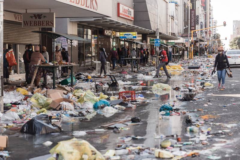 Debris outside a mall in Durban after five days of rioting and looting across South Africa that has seen 1,200 arrests made and caused 72 deaths. AFP