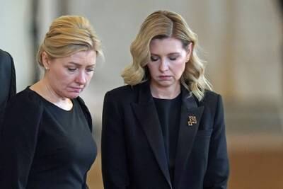 The first lady of Ukraine, Olena Zelenska (R) views the coffin of Queen Elizabeth II, lying in state on the catafalque in Westminster Hall in London. Getty Images