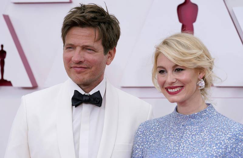 Thomas Vinterberg, left, and Helene Reingaard Neumann arrive to the Oscars red carpet for the 93rd Academy Awards in Los Angeles, California, US, April 25, 2021. AP Photo