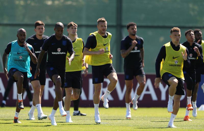 England's Jamie Vardy, centre, with teammates during training. Lee Smith / Reuters